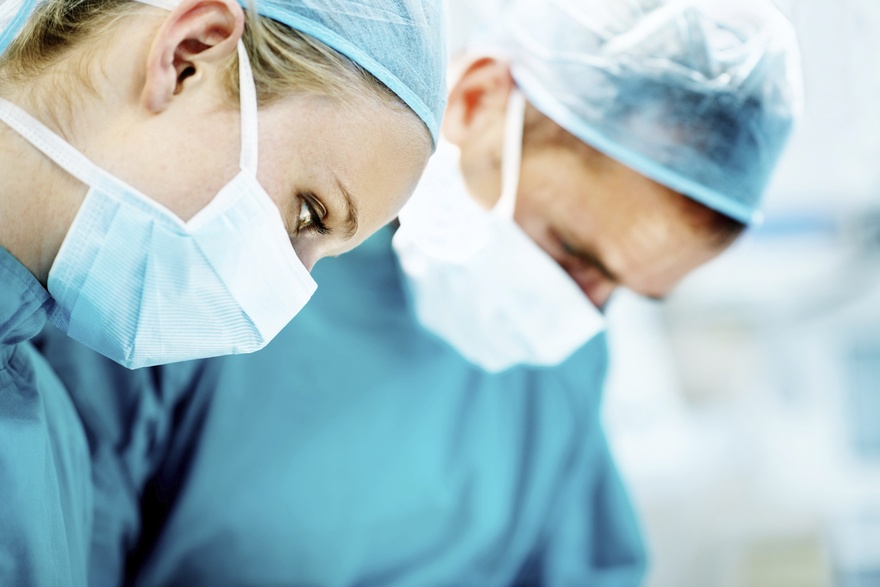 Two surgeons working together in an operating room